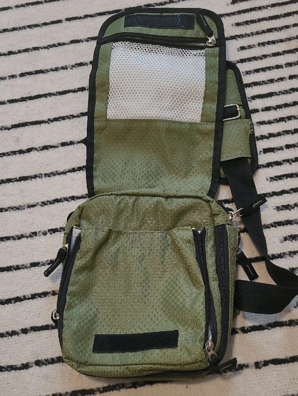 HEYS Olive Green Sling Messenger Bag with Adjustable Strap